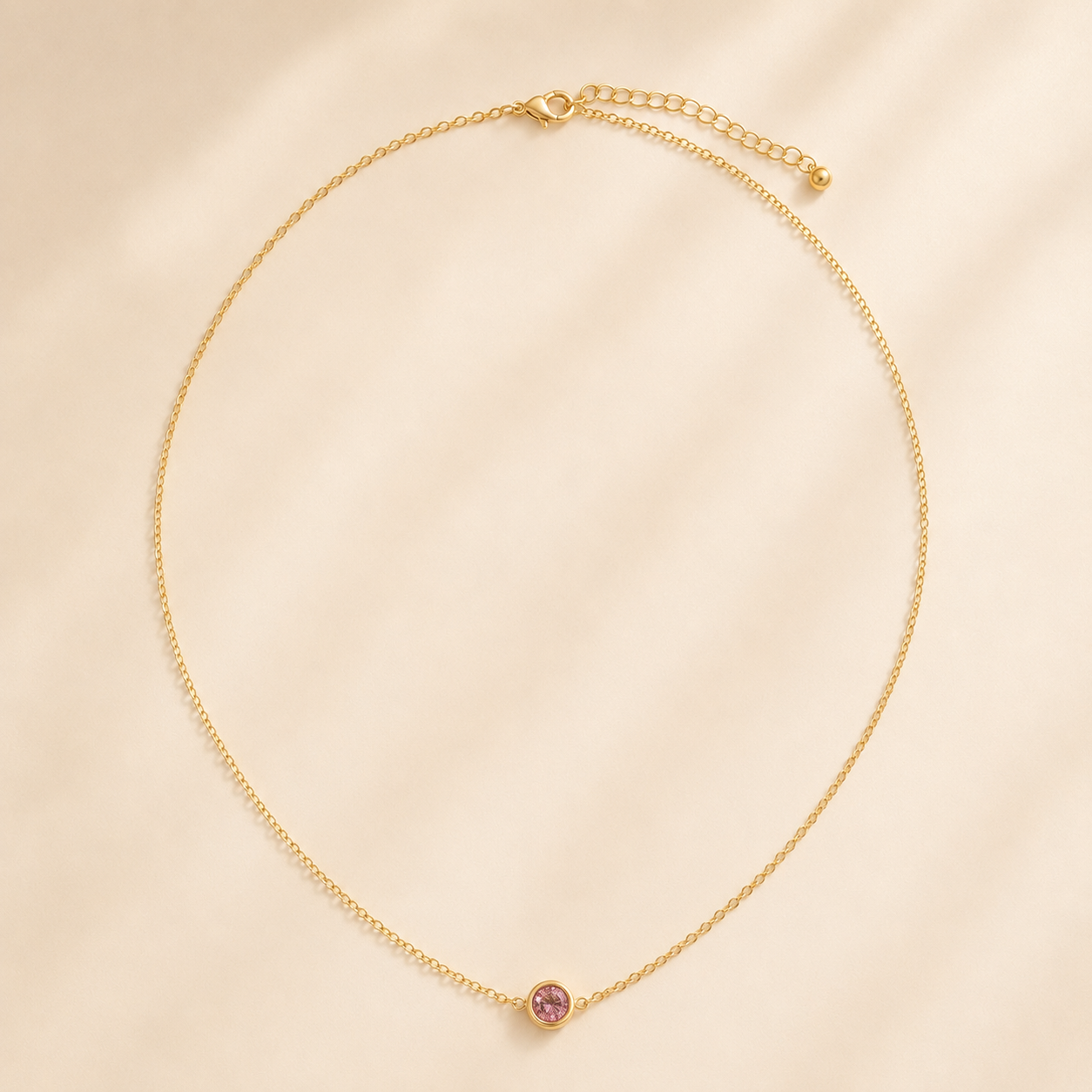 CAPRI Birthstone Necklace — gold chain and stone close-up