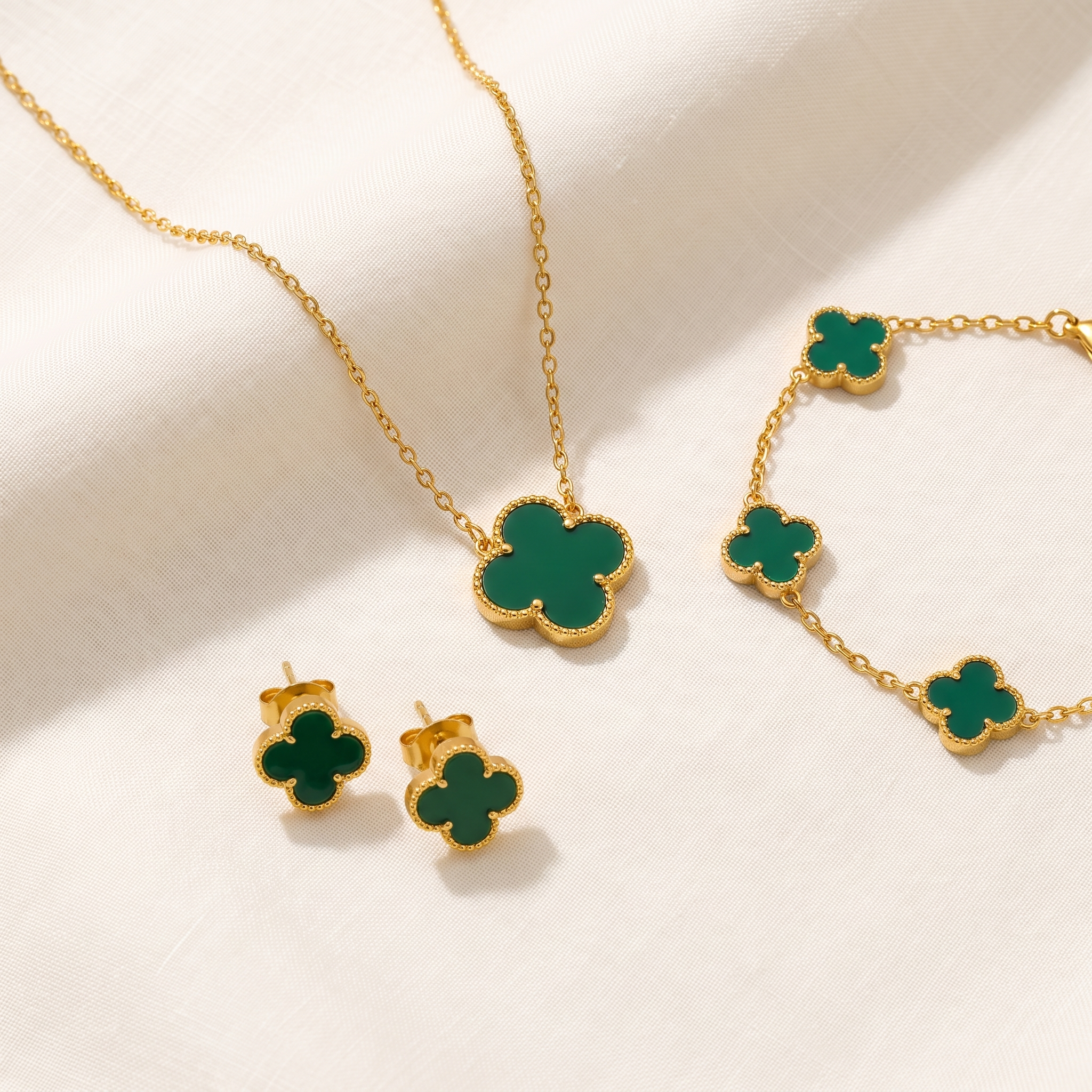 Valecourt clover parure — matching necklace, bracelet and stud earrings