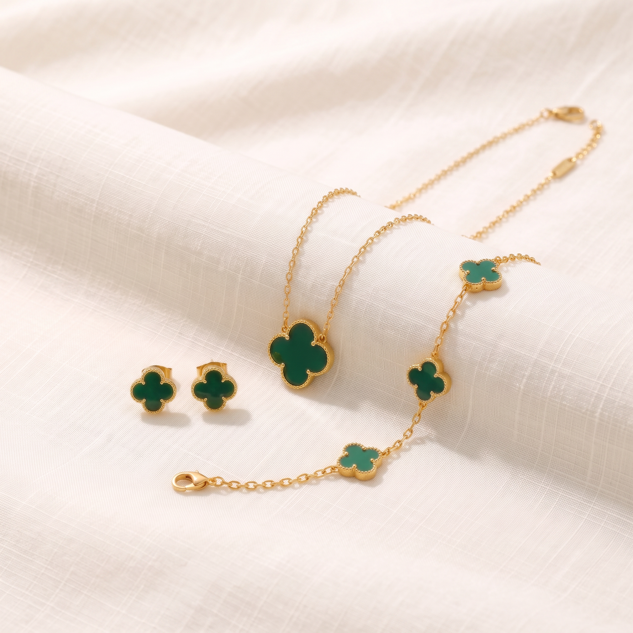 The Clover Set — necklace, bracelet and studs styled together